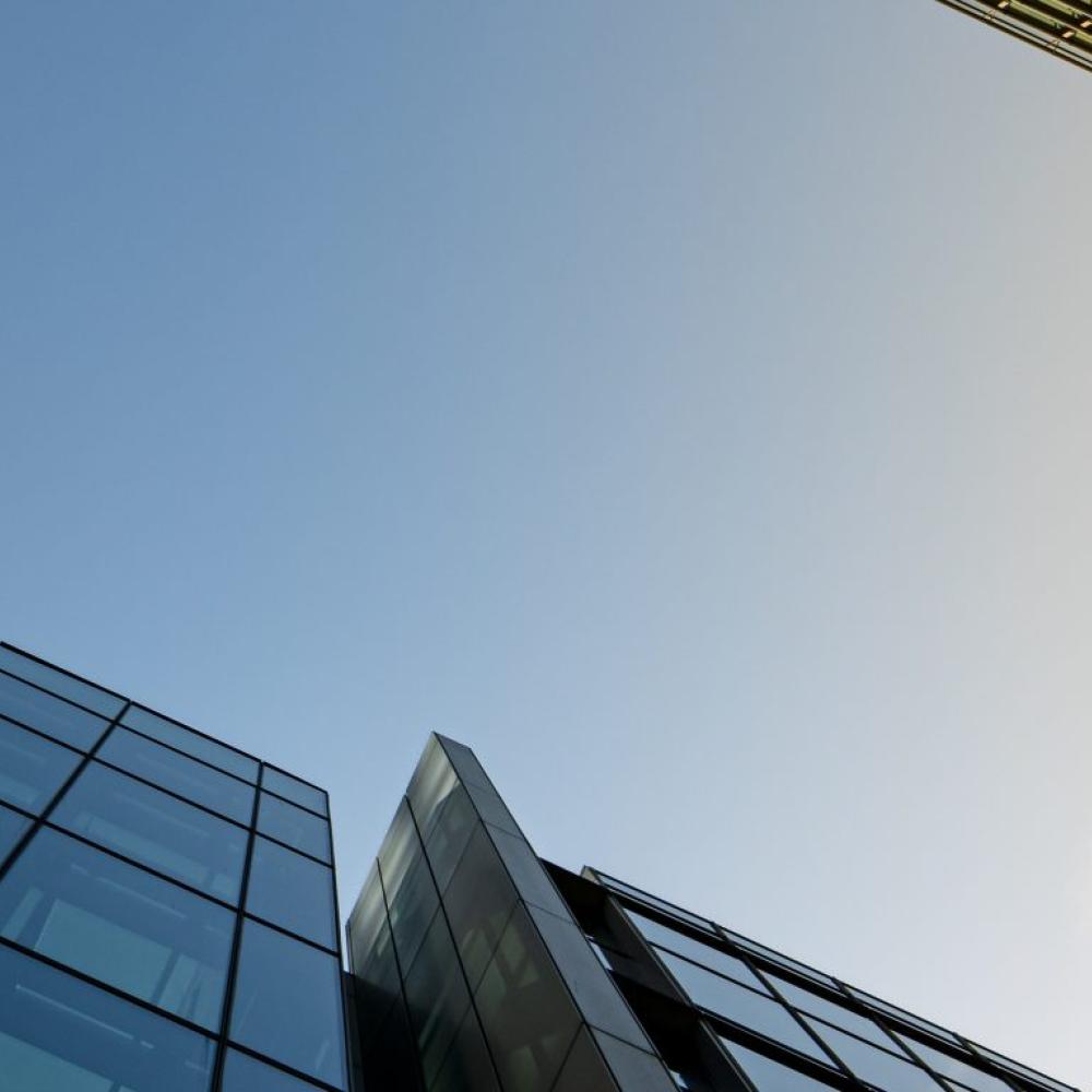 Looking up through skyscapers